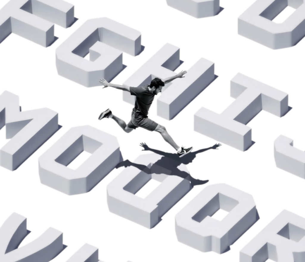 A man jumping across the letters of the alphabet